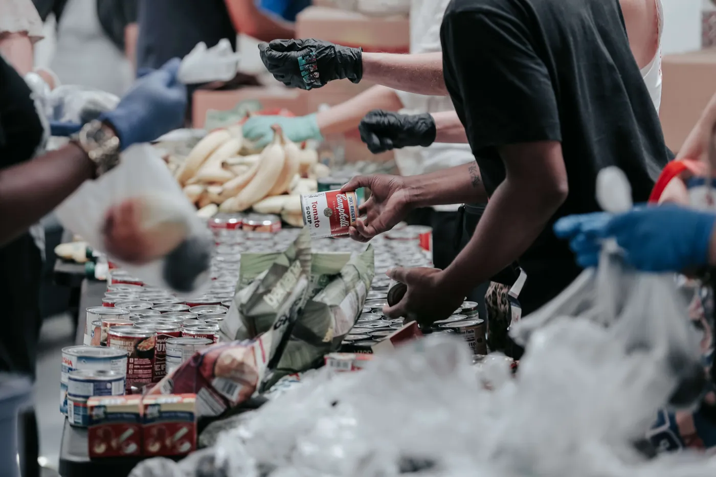Volunteers preparing food for people in need